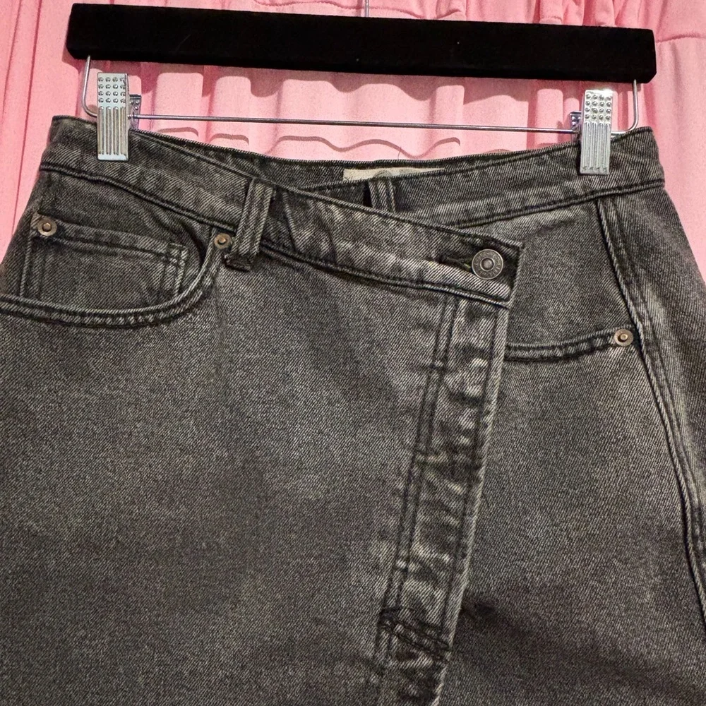 We The Free Black Frayed Asymmetrical Wrap Mini with Button Fly Closure. - Picture 3 of 5